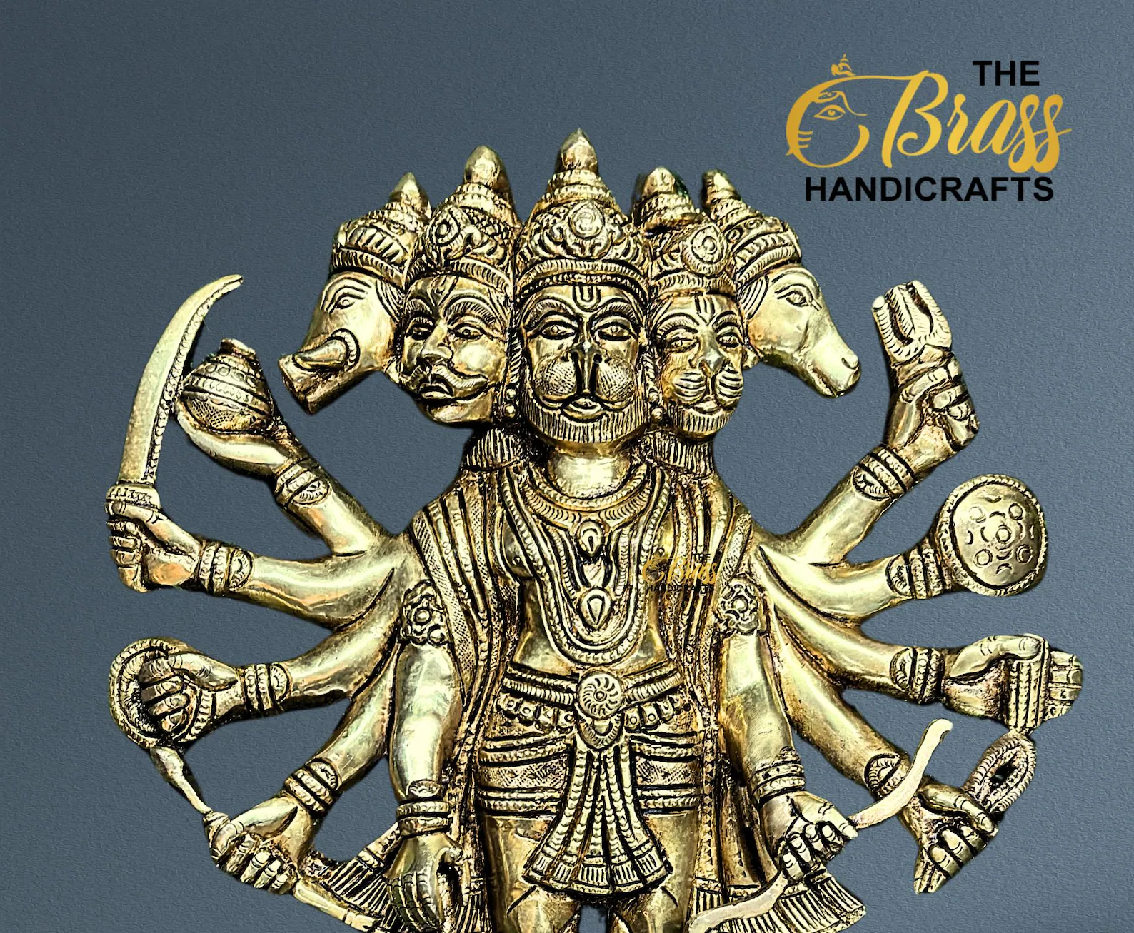 Ornate brass statue of a multi-headed, multi-armed Hindu deity on a blue-gray background; The Brass Handicrafts logo appears in the top right.  thebrasshandicrafts.com
