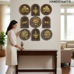Woman in a light outfit stands by a dark wooden console table, admiring a wall display of gold brass plaques in circular, arched, and floral shapes  thebrasshandicrafts.com