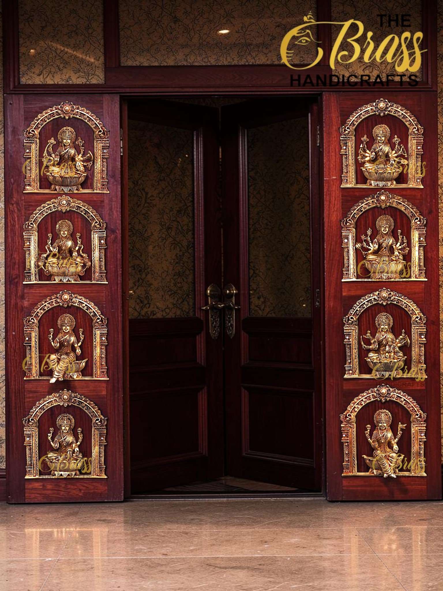 Wooden doors with gold Brahma-like deity panels set in carved arches on both sides of the doorway.  thebrasshandicrafts.com