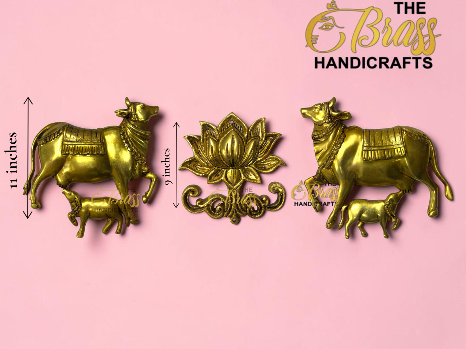 Gold brass cow statues flanking a central lotus ornament on a pink background, with 'The Brass Handicrafts' branding visible.  thebrasshandicrafts.com