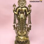 Back view of a gold brass multi-armed statue with ornate headdress against a pink background, part of The Brass Handicrafts product line.  thebrasshandicrafts.com