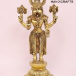 Gold brass statue of a Hindu deity with multiple arms and an ornate headdress, standing on a carved pedestal.  thebrasshandicrafts.com