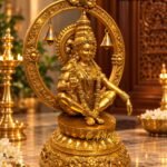 Golden Brass Deity in Temple Glow - thebrasshandicrafts.com Gold statue of a Hindu deity seated with an ornate circular halo and hanging bells in a temple setting. thebrasshandicrafts.com