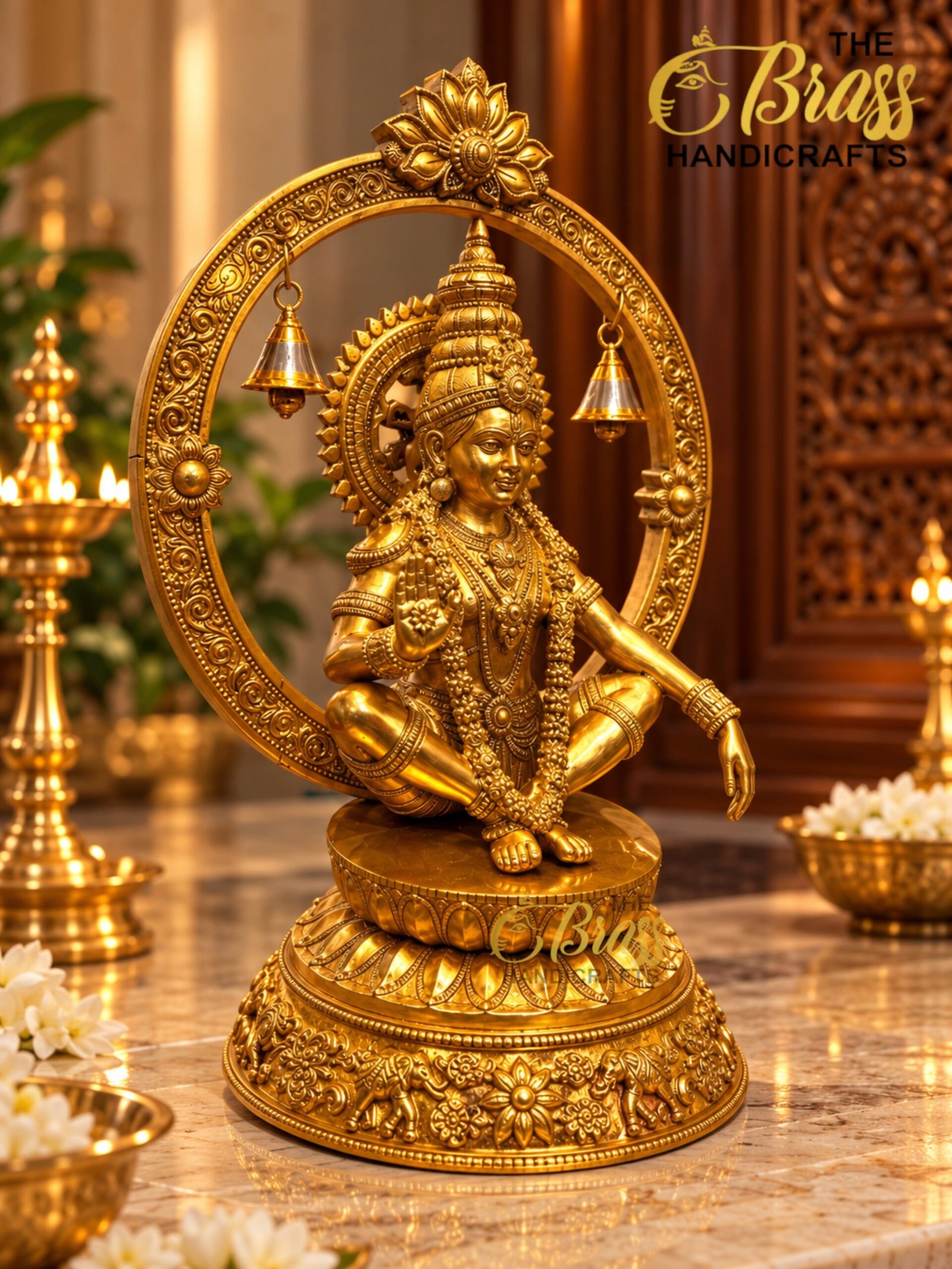 Golden Brass Deity in Temple Glow - thebrasshandicrafts.com Gold statue of a Hindu deity seated with an ornate circular halo and hanging bells in a temple setting. thebrasshandicrafts.com