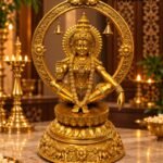 Golden Deity Altar with Lamps and Flowers - thebrasshandicrafts.com Golden statue of a Hindu deity seated in a detailed circular arch, with hanging bells and ornate floral engravings, on a marble altar. thebrasshandicrafts.com