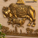 kamdhenu 66inches 2 - thebrasshandicrafts.com Gold-toned ornate elephant sculpture with intricate filigree against a decorative floral wall, a brass handicrafts display. thebrasshandicrafts.com
